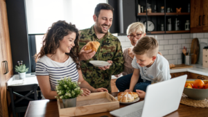 American soldier finally at home with his family stock photo